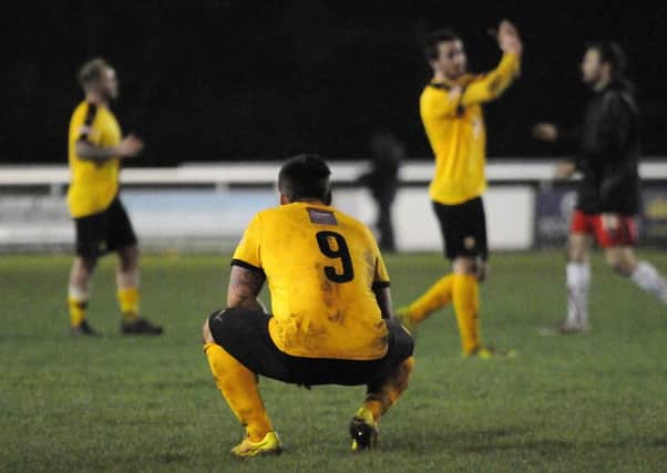 Ben Mackey sinks to his knees after Leamington's extra-time FA Trophy defeat to Altrincham. Picture: Morris Troughton