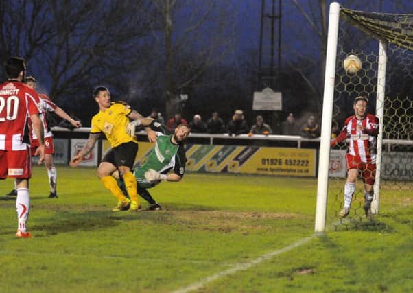 Ben Mackey gains reward for his persistence with Leamington's equaliser in the 90th minute. Picture: Morris Troughton