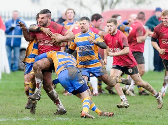 Alex Tansley in Lions' win over Old Leamingtonians (Pictures by Mike Baker)