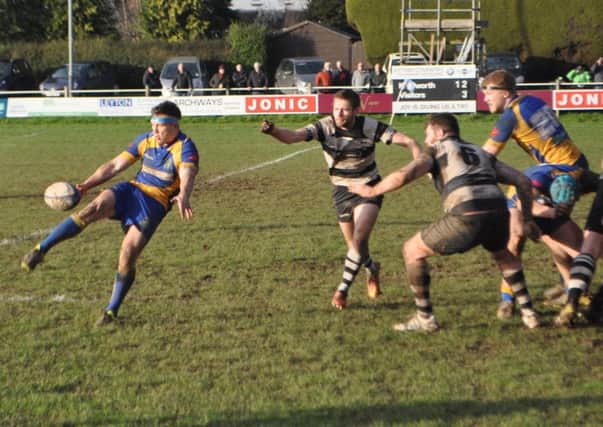 Gaz Renowden clears his lines in the first half of Kenilworths clash with Stratford. Picture: Johnny Marsh