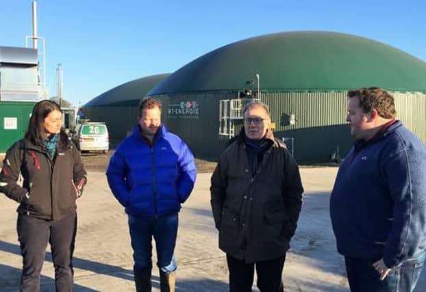 Davina Horner, relationship manager at Yorkshire Bank (far left), Andrew Channing, managing director at Channing and Sons (centre left), Mark Pawsey MP (centre right) and Alastair Channing, (far right) outside the anaerobic digesters.