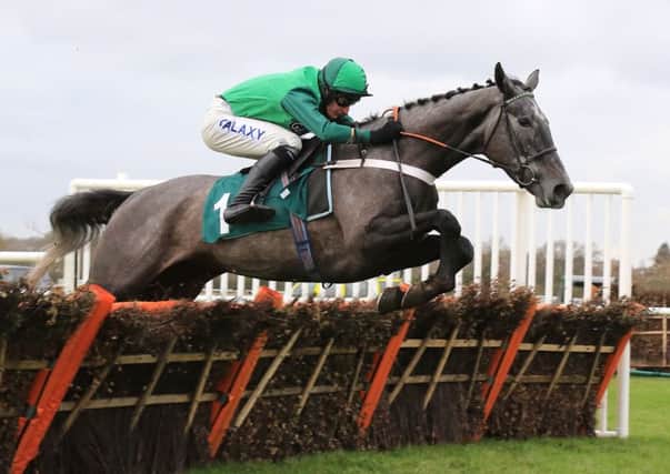Fixe Le Kap (Daryl Jacob) jumps the last on his way to victory in the opener. Picture: dwprattracingphotography.co.uk