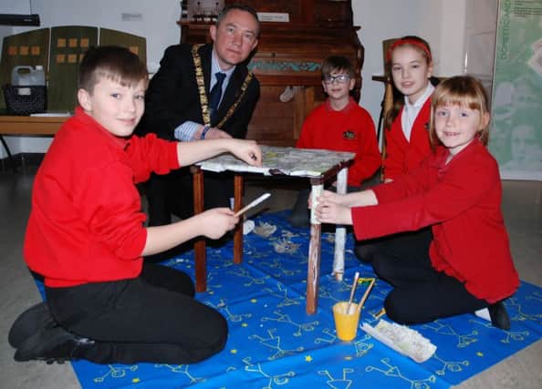 Mayor of Rugby Cllr Richard Dodd joined pupils from Clifton-upon-Dunsmore Primary School to mark Holocaust Memorial Day