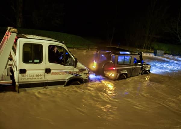 A 4x4 helping a recovery vehicle through the ford. Photos courtesy of Stuart Insall