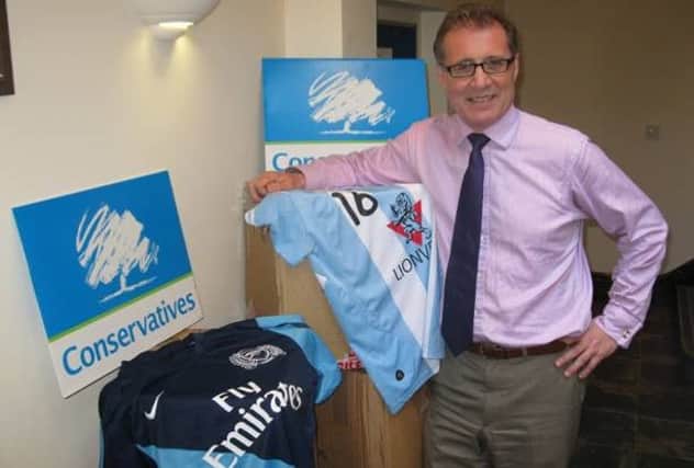 Mark Pawsey MP is collecting football shirts to donate to Rwanda