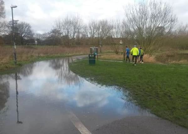 A picture from club, Run Warwick captioned: "Fun in St Nics Park today as the group avoided a large watery obstacle".