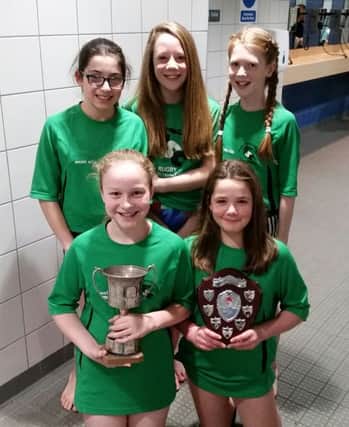 Rugby's 10-11 girls with their well-deserved trophies