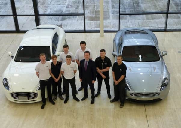 Jeremy Wright with apprentices from Aston Martin