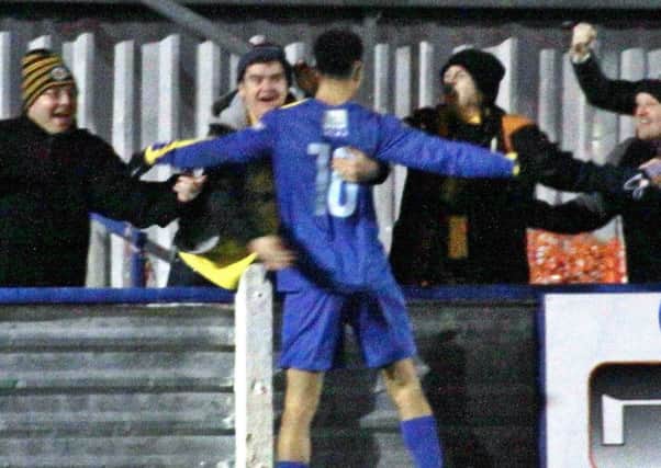Courtney Baker-Richardson celebrates with the fans after his late winner. Picture: Sally Ellis