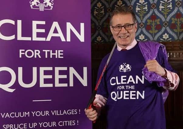 Rugby MP Mark Pawsey cleans for the Queen.