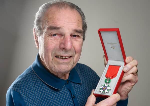 Leslie Johnson, 93, has received a Ordre national de la Legion d'honour medal from the French Government for his part in helping liberate France in the Second World War. NNL-160223-215723009