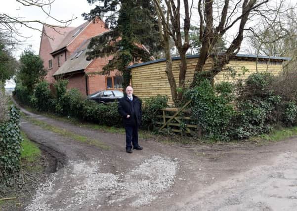 Cllr Tony Heath at the entrance to the proposed housing site at Hazelmere & Little Acre in Whitnash.