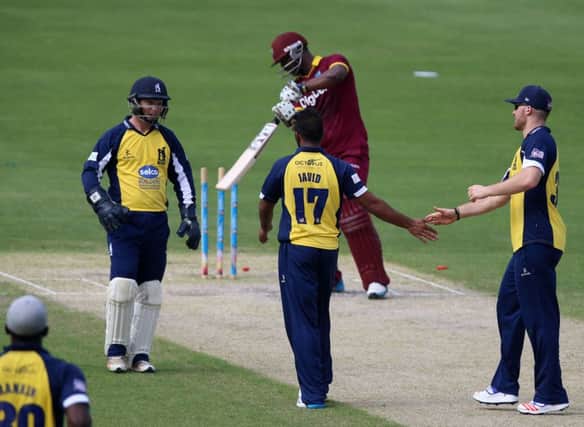 Picture: whiteoakpictures
.co.uk (Dubai)

Birmingham Bears v West Indies - Ateeq Javid takes the wicket of  West Indies Johnson Charles