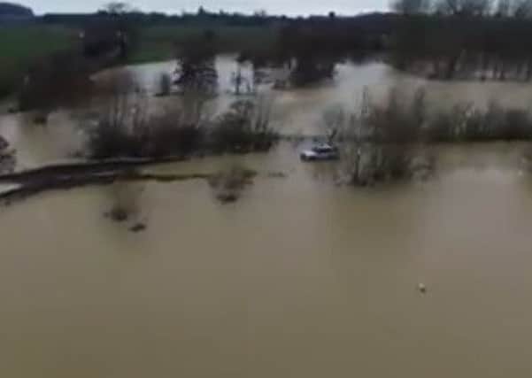 An aerial shot of the floods filmed by drone company Infinite Pixel