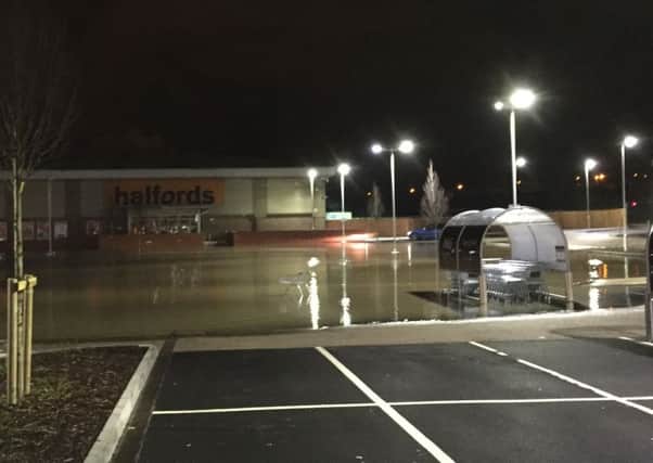 Elliott's Field flooded last night. Photo by Carolyn Peel NNL-161003-124155001