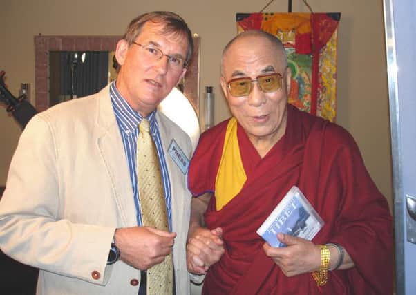 Nick Gray presents the DVD of his documentary Escape From Tibet to His Holiness the Dali Lama.