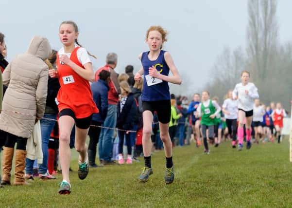 Mel Gould (2) on her way to second place at the Warwickshire Schools Championships. Picture: Mike Baker.
