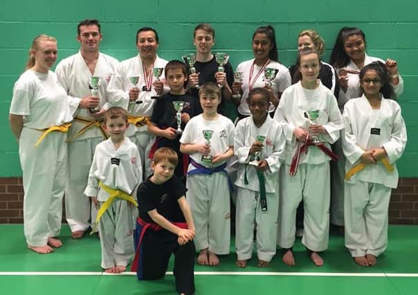 Patrick Carter's students with their trophies and medals from the English Championships
