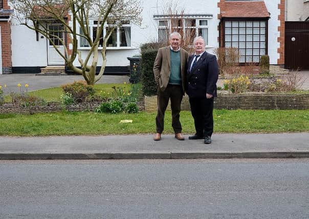 Cllrs Alan Cockburn and Dave Shilton at the site of the proposed crossing in Birches Lane. Copyright: John Cooke Photography