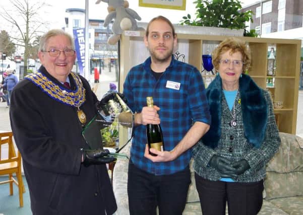 The Shakespeare Hospice Furniture Store presented with the first place trophy by the town mayor and mayoress. Copyright: John Cooke Photography