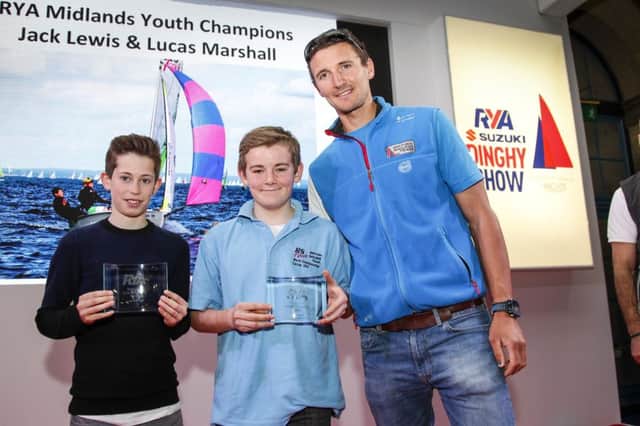 Draycote Water SCs RYA Youth Champions, Jack Lewis and Lucas Marshall receive their Midlands award from three-time World Champion Finn sailor Giles Scott