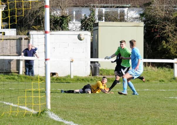 Jamie Smith puts the ball wide against Studley after losing his footing. Picture: Morris Troughton