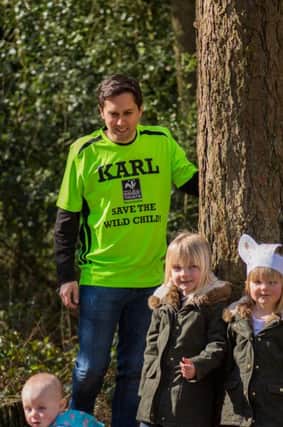 Karl Curtis with children at Tile Hill Community Children's Centre. Picture by Stephen Cheshire.
