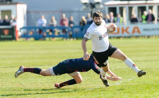 Wing Adam Attenborough in Lions win over leaders Evesham two weeks ago