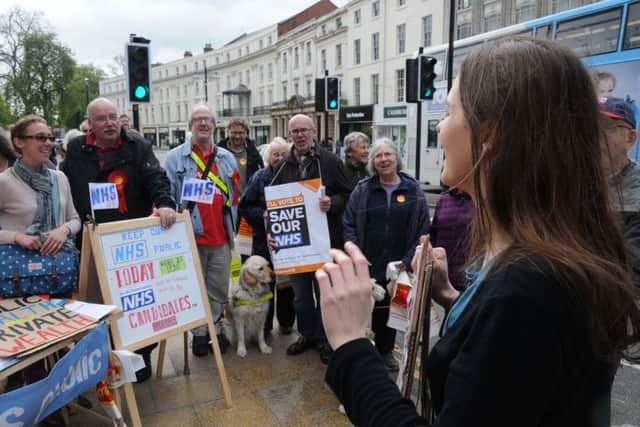 NHS protest - coordinated by 38 Degrees across the country.Local one organised by South Warwickshire Keep our NHS Public outside Leamington Town Hall.Protestors join in a sing-song. NNL-150425-185547009