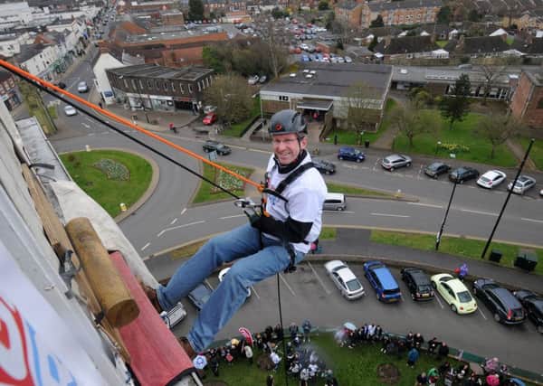 Abseiling down the Holiday Inn in Kenilworth to raise money for Teenage Cancer Trust in the memory of local teenager Milan Patel, who died of cancer a year ago. Jeremy Wright MP. MHLC-09-04-16-Abseil for Milan Patel NNL-160904-221307009