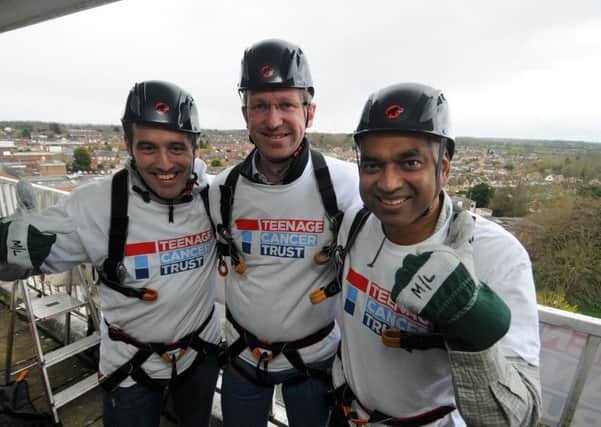 Abseiling down the Holiday Inn in Kenilworth to raise money for Teenage Cancer Trust in the memory of local teenager Milan Patel, who died of cancer a year ago. Intrepid abseilers Cllr Richard Hales,  Jeremy Wright MP and  Milan's father Rash Patel . MHLC-09-04-16-Abseil for Milan Patel NNL-160904-221406009