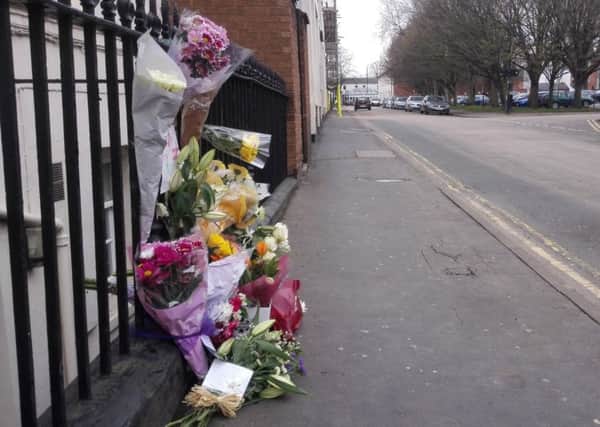 Flowers and messages of condolence and sympathy have been left near the scene where a man was attacked in Russell Street, Leamington. He later died of his injuries.