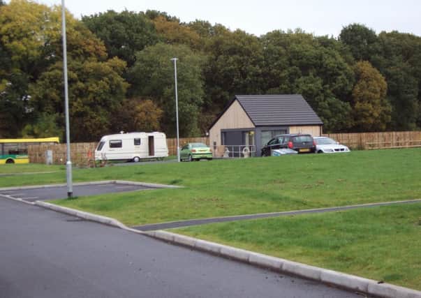 A Gypsy and Traveller site with permanent pitches like that which Warwick District Council must provide.
