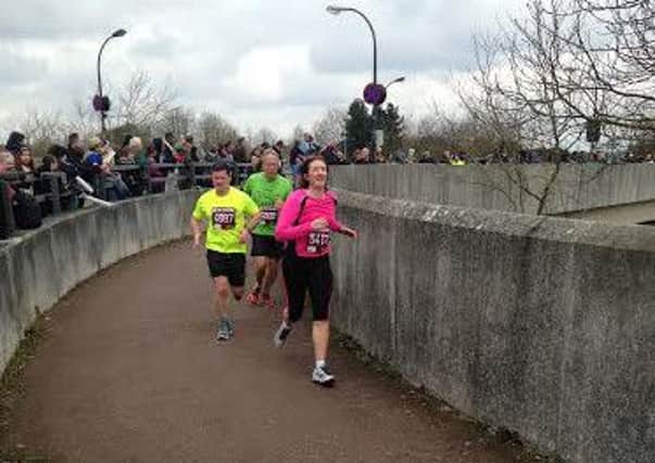 Collette O'Keefe (in pink top) is running the London Marathon to raise funds for Castel Froma.