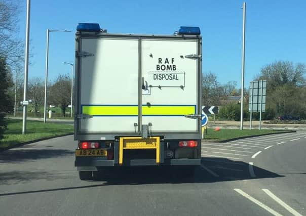 The bomb disposal team seen in Newbold Road. Picture by George Thurkettle NNL-160420-142452001