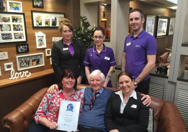 Priors House staff Lucy Frost, Siobhan Kearns, Jon Sneath, Francine Summers and Tracey Frisby with Norman Edwards, one of the care home's first residents.