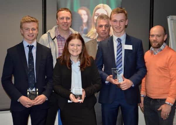 Young Enterprise winners Will Button, Georgie Feller and Harvey Innocent with judges Roger Greasby,  Andrew Mitchell and Wes Stanton.