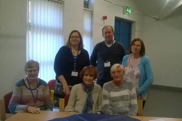 Hilary White with volunteers at the Brunswick Hub Dementia Cafe.