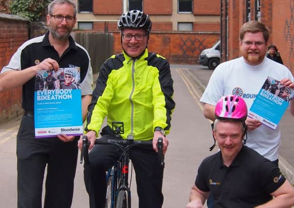 Rugby MP Mark Pawsey with organisers of the Bikeathon.