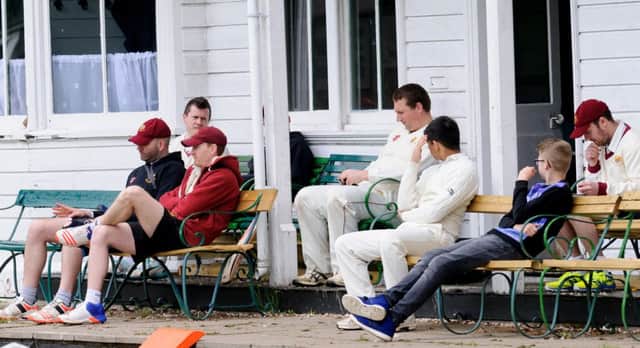 Rugby batsman watching their innings before the rain at tea on Saturday