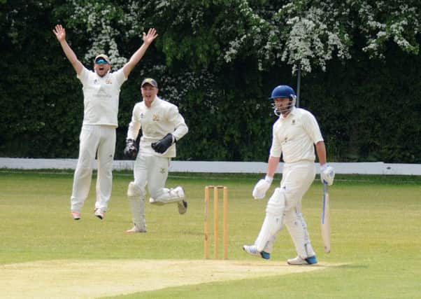 Kidderminster's Nick Round is caught behind off the bowling of Brinder Phagura. Picture: Morris Troughton