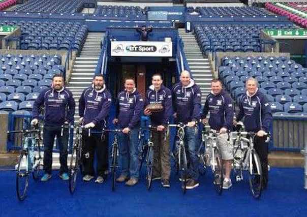 Simon Storey and fellow cyclists at Murrayfield Stadium in Edinburgh.
