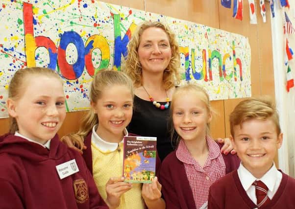 Knightlow Primary School pupils with reception teacher and lead on the Stories4Schools project, Cathy Amos-Simpson.