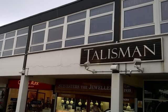 The gym could operate on the first floor of this building if it opens