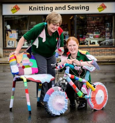 Sewing & knitting shop Sew Arty in Kenilworth has 'yarn bombed' a bike and chair and other items, before the Aviva Womens Tour.

Pictured: Leanne Hickman & Di Carter. NNL-160614-225534009