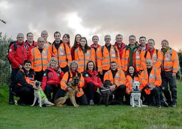 Warwickshire Search and Rescue team picture. O0-s4T_MEhuC6bInt17s