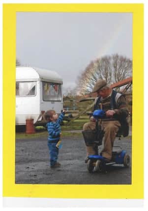 Anabelle Gibson, seven, has won the Generation P competition with her photo of her little brother and Grandad looking at a rainbow.