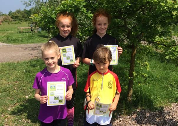 Florence, Tabitha, Tilly and Max with their Forest and Wood certificates