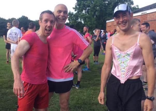 Leamington C&AC runners Eoin O'Flynn, Graham Garlick and Paul Caruana get into the spirit for Saturday's pink parkrun. Picture submitted