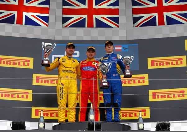 Jordan King enjoys his moment on the top of the podium after winning Sunday's GP2 Series sprint race.